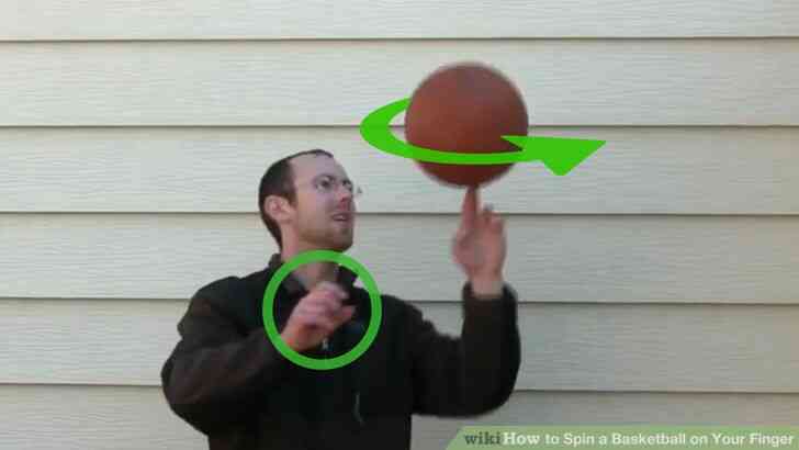 Image intitulée Spin un ballon de Basket sur le Doigt Étape 14